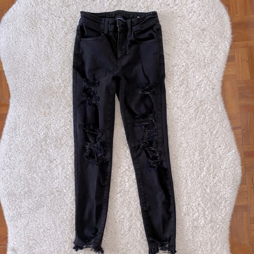 Really ripped black AE Jeans